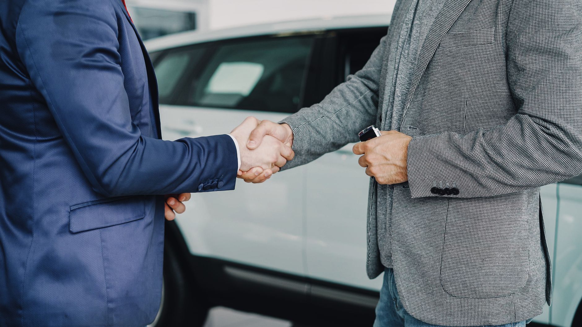business owner meeting client, professional handshake