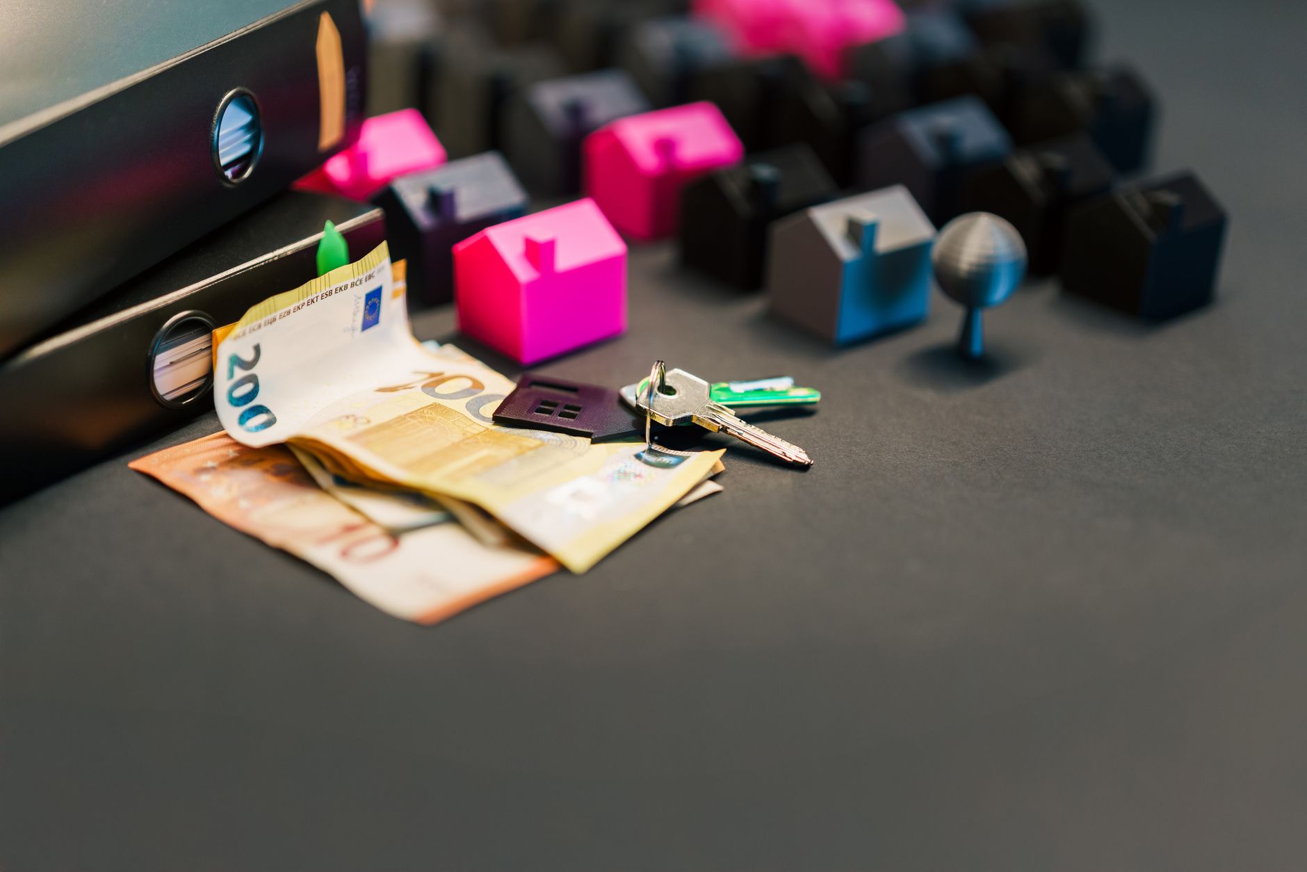 car keys on desk with financial documents