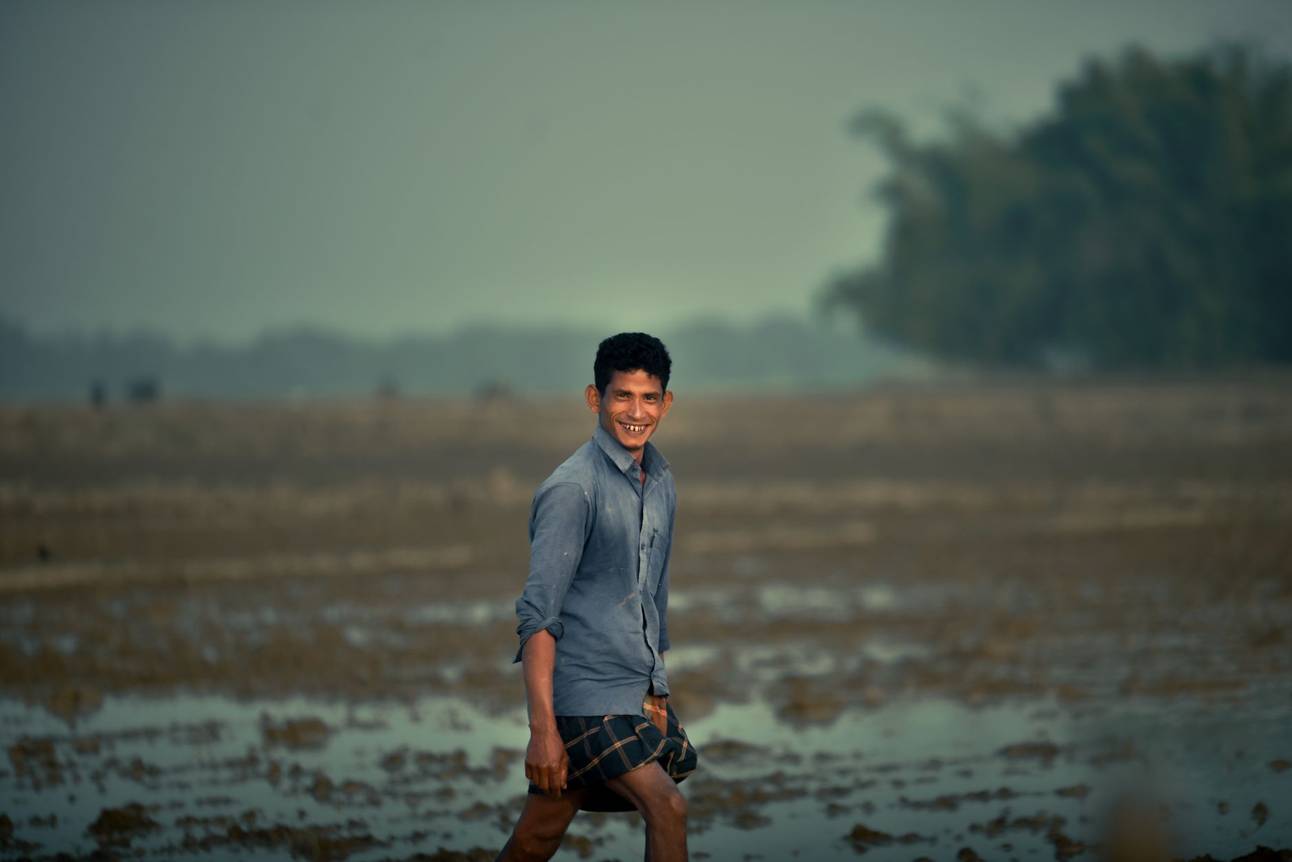 happy farmer working in field