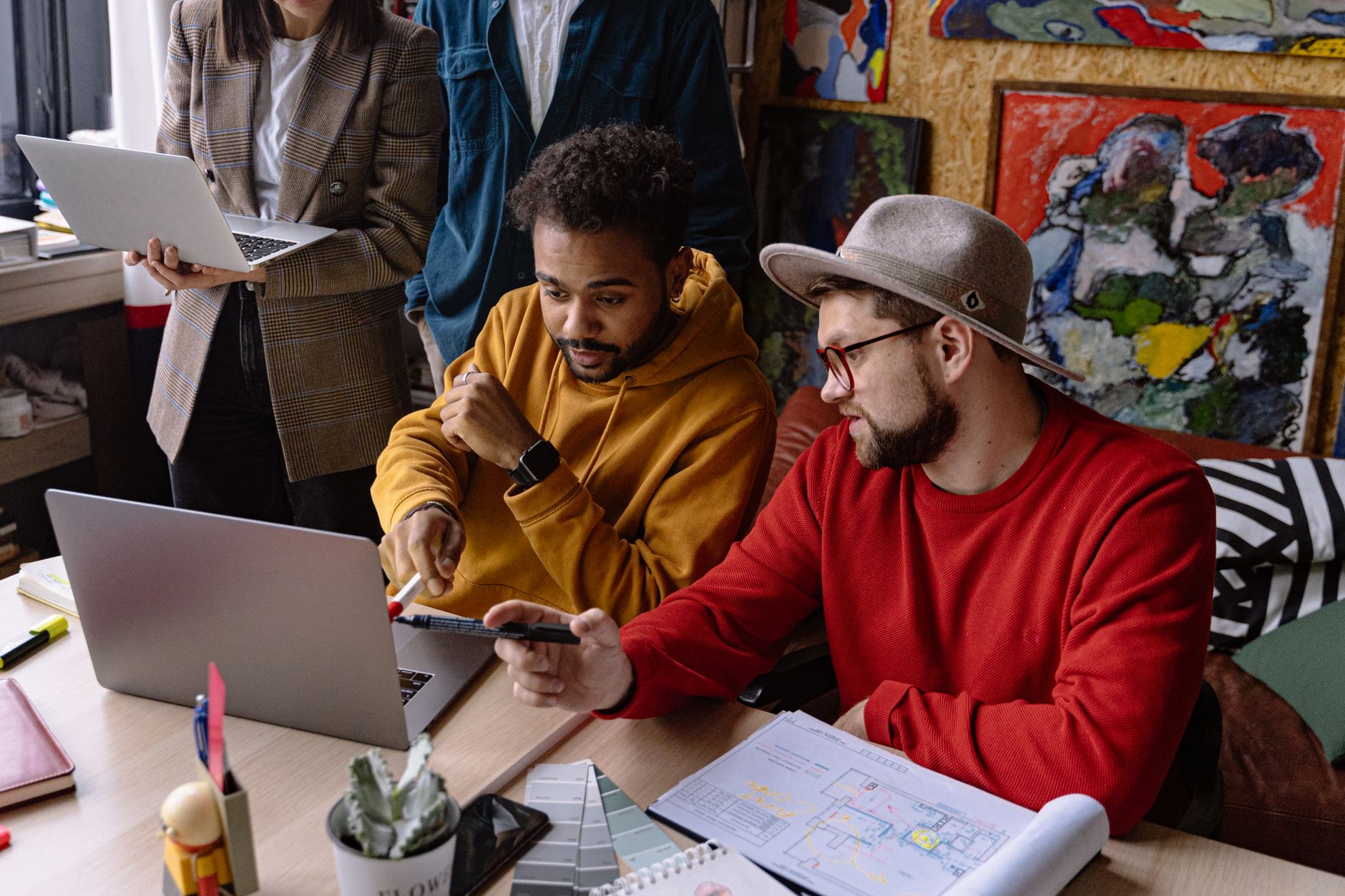 modern creative studio interior with people collaborating